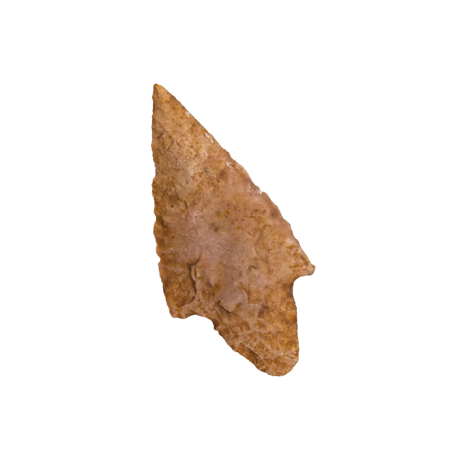 Photo of an ancient chert arrowhead (Later Neolithic), whose shape resembles today's computer cursors with its triangular and pointy shape.